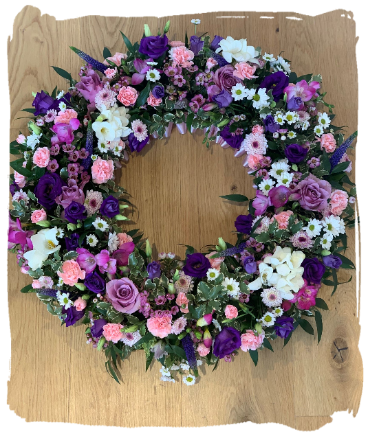 pink and purple funeral wreath