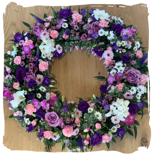 pink and purple funeral wreath